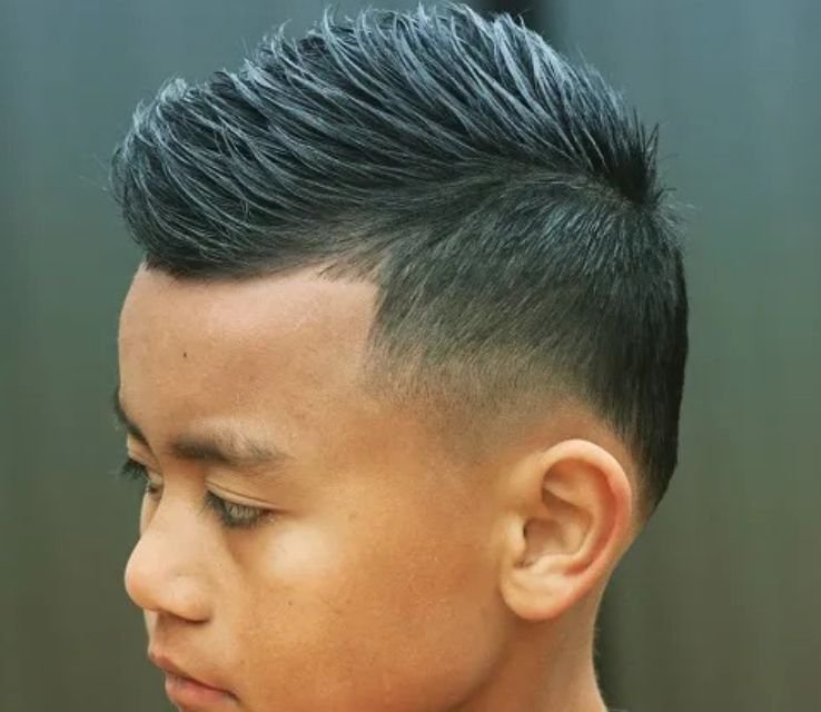 Textured Short Spiky Hair With Mid Skin Fade